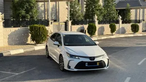 toyota-corolla-1800-hybrid-عداد-قليل-و-ولا-غرام-بوية-إضافات-مميزة-و-بسعرررررررررررررر-حررررررررقق