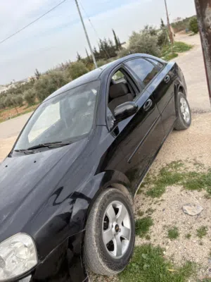 شفروليه أوبترا موديل 2008 بحاله الوكاله مرخصه لغايه شهر خمسه جنطات جداد دهان وكاله