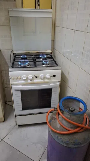 فرن مع اسطوانة غاز بحالة جيدة