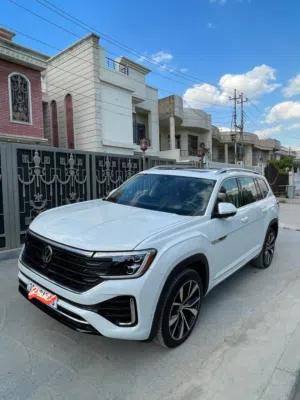 VolKswagen  Atlas SEL Premium R_Line    وارد امريكي اللون ابيض فول الفول أعلى فئه2024