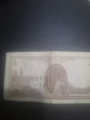 نادره-- تحفه -- شاركت بمزاد وصل السعر لل 750$ ليره سوريا واحدا 1982م. 1402ه تواجد سوريا