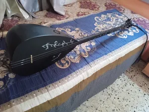 ‏جيتار و عود ‏.‏ جديد‏0