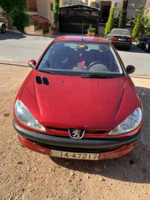 ييجو 2002 احمر للبيع