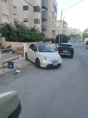 فيات 500e 2014 كهربائية هاتشباك أبيض برخصة ومواصفات أمريكية