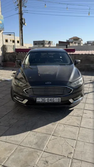 فورد فيوجن 2017 هايبرد رمادي مرخصة بحالة جيدة مع مواصفات أمريكية وتكنولوجيا حديثة