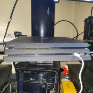 جهاز ps4 pro مهكر فيه 10 العاب بنغازي
