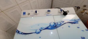 غساله شبه جديد 60000الف بس عرطه