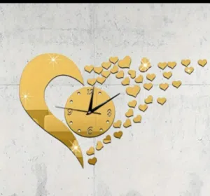 ساعه حديثه علي شكل قلب تتلصق علي الحائط روعه