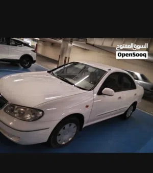 Nissan Sunny 2005 model White color perfect car 100 percentage Masallah.