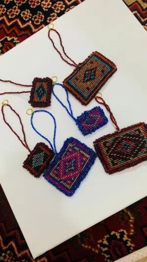 Each keychain is 5 OM