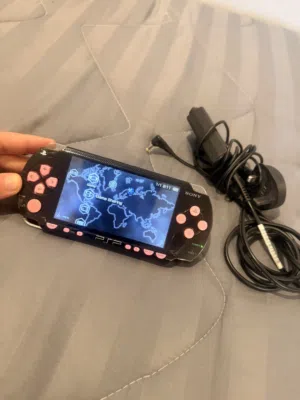 Psp 1000 moded with charger and many games