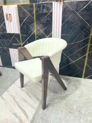 انغمس في جمالية الفخامة والأناقة مع كرسي الطعام المودرن بأرجله المنحنية، واجعل تناول الطعام تجربة فر