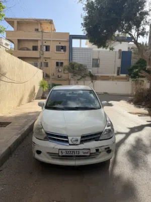 نيسان تيدا توماتك