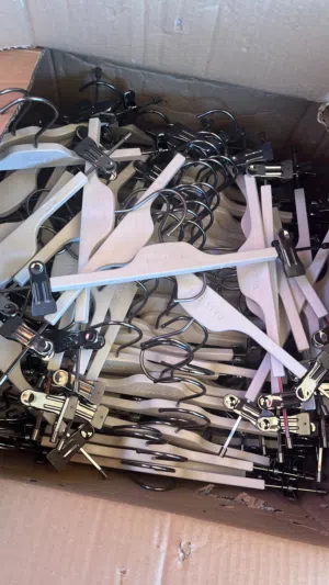 Plastic hanger with metal clip