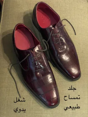 احذية جلد طبيعي وشنط كتف رجالي ماركات مشهورة.