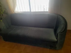 3 - 4 seater sofa in green velvet fabric good condition