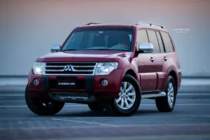 MITSUBISHI PAJERO 2010 RED 3.6L V6 _ FULL OPTION 7 SEATER _ GREAT CONDITION