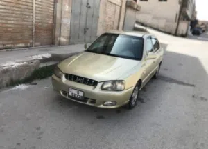 هونداي فيرنا موديل 2001 بحالة الوكالة مانور اصلي 1500و الشرا ما بقصر معه