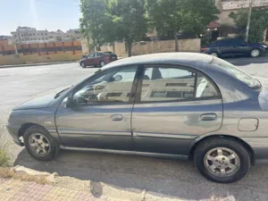 سيارة كيا ريو اوتوماتيك مرخصة ومؤمنة 2027 مجدده ميكانيكيا و دهان قابل للتفاوض مع كاميرا خلفية جديده