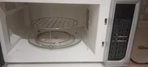 TIT brand appliance, specifically model TM-43SG. Microwave Mode: 1500 WattsGrill Mode: 1250 Watts