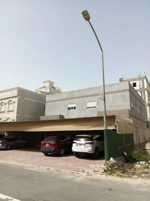 مدينه صباح الاحمد قسيمه الدور الارضي والدور الثاني شقتين