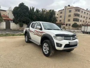 بك اب ميتسوبيشي دهان الوكالة 4X4 دفع رباعي دبل كبين بحالة الوكالة سيرفس كامل فحص أربعة جيد