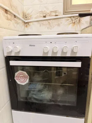 Four electric burner stove with oven, working perfectly fine