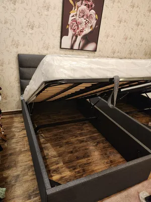 Bed for one person/single bahraini wood - almost newGrey color with the mattress, beneath is storage