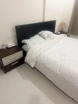Queen size Bed, Mattress and two side tables