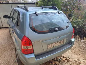 توسان GLS 2006 موديل 2006 بالأزرق الفاتح مع مواصفات كورية ورخصة مرخصة