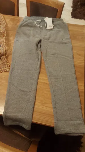 بنطلون ماركة LACOSTE جديد صناعة بنغلادش قطن قماشة دافية قياس لارج لون سكني بنطلون PULL & BEAR لون اس