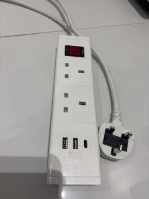 UK-style extension power strip with 2 outlets and 2 USB charging ports