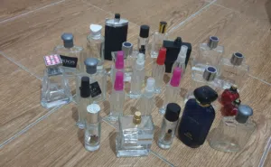 عطور زجاجية فارغه للبيع باحجام مختلفه وانواع مختلفه سمكية والوان مختلفه