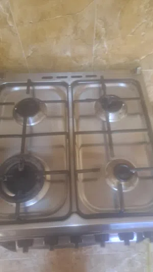 غاز مع فرن 4 عيون