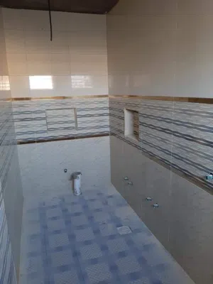 خلفه تطبيك ارضيات بورسلاين ومرمر وكاشي وجداري