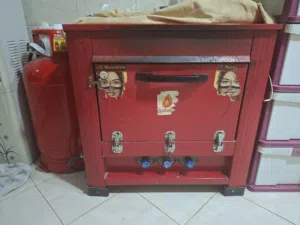 فرن غاز فلاحي مع أسطوانة غاز كبيرة