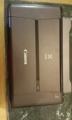 طابعه الوان محموله كانون اصلي wifi حجمها صغير جدا وتتحرك بيها