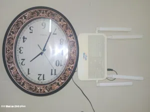Wall Clock with Omantel Wi-Fi Router for Sale