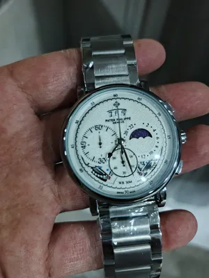 Patek Philippe . Analog Quartz . Silver1