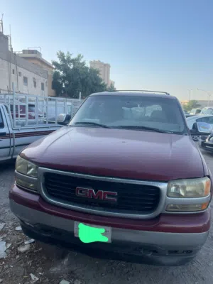سيارة جي إم سي يوكن 2002 بمواصفات أمريكية وداخل أحمر للبيع للتواصل