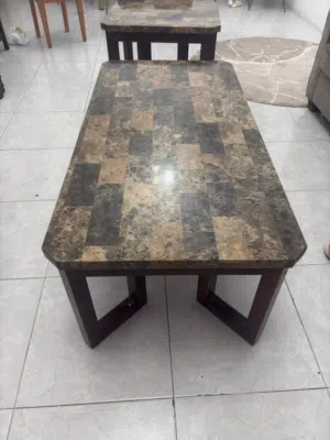 Selling a marble top coffee table with a matching side table in good condition