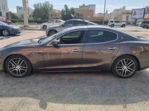 Used 2014 Maserati Ghibli Sedan in Brown with Advanced Features