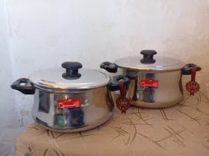 4 حلل ستنلس ستيل بومبيه الأهرام بمقابض لا توصل الحراره