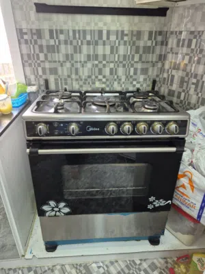 Midea Gas oven gas cooker , 5 stoves, 35 bd only