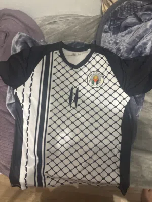 New Palestine t-shirt with the it’s plasticbag