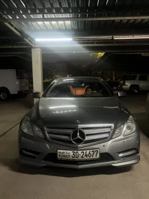 مرسيدس بنز الفئة-E E 250 موديل 2012 كوبيه كت AMG فضي مع مواصفات خليجية، شرط الفحص ،ورقة الفحص موجوده