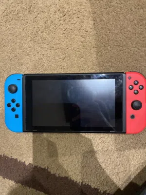 Nintendo switch 128gb with micro sd card and controller and tv connecter