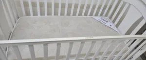 Juniors Crib with Juniors mattress and Juniors bumper