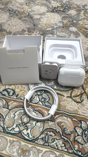 Apple AirPods Pro (2nd gen) with charging case and braided Lightning cable just open box only