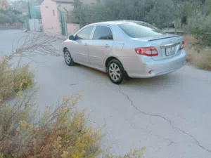 تويوتا كورولا 2008 جير عادي خليجي ماتور 18ccكندش حامي بارد فحص مرفق